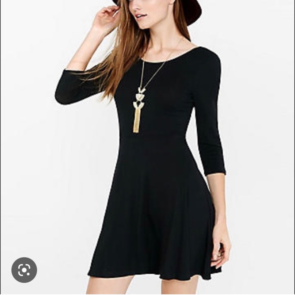 Express Black Skater Dress. Has Stretch & 3/4 sleeves.
